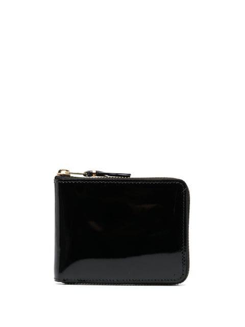patent leather zipped wallet by COMME DES GARCONS