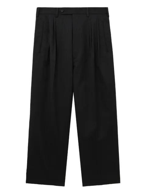 pleated pinstripe trousers by COMME DES GARCONS