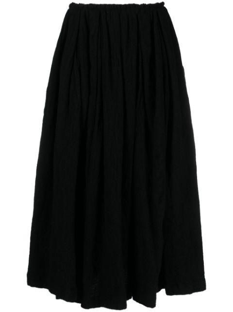 pleated wool skirt by COMME DES GARCONS