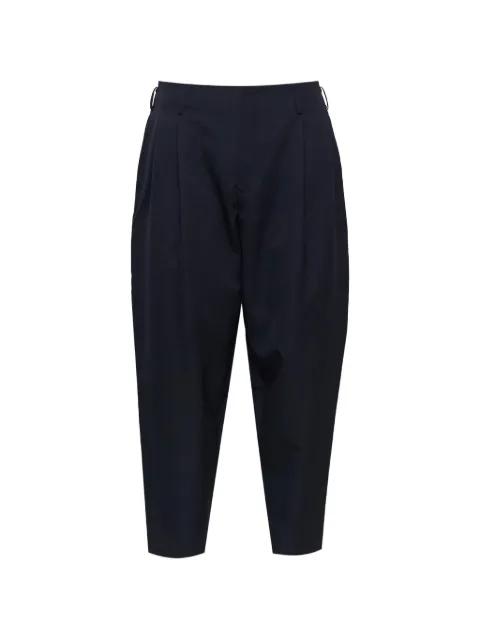 pleated wool trousers by COMME DES GARCONS