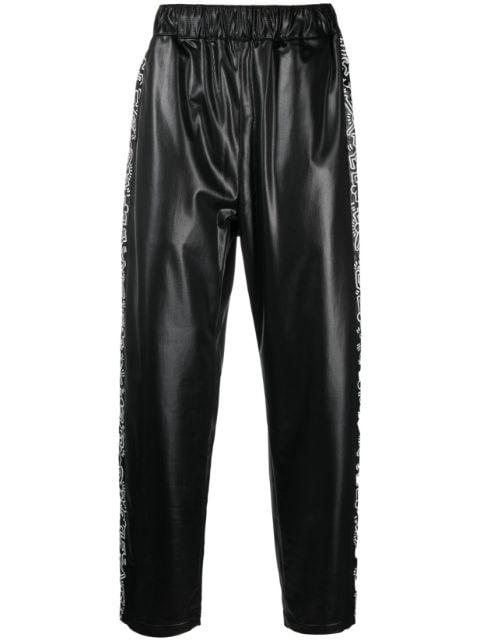 x Keith Haring graphic-print track pants by COMME DES GARCONS