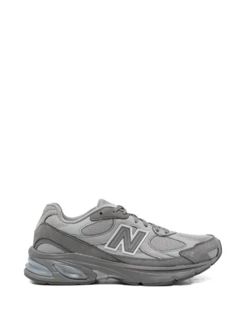 x New Balance panelled mesh sneakers by COMME DES GARCONS