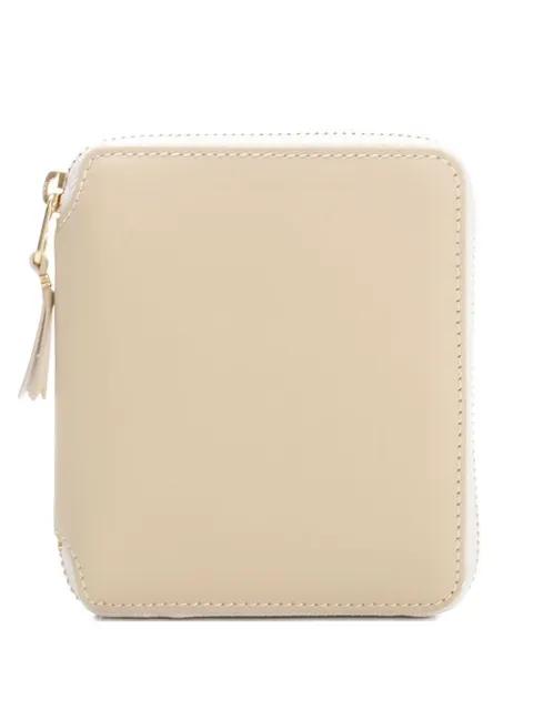 zip-around leather wallet by COMME DES GARCONS