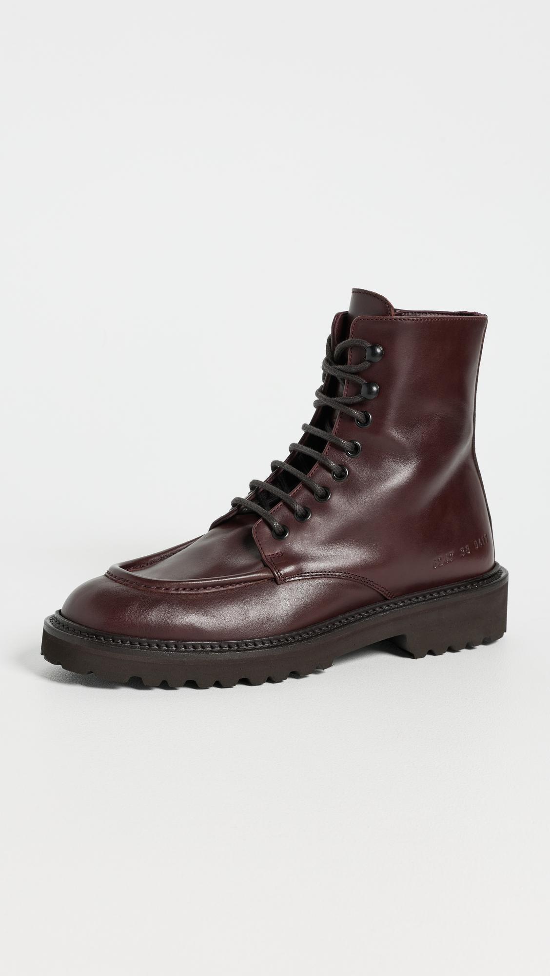 Lace Up Piuma Leather Boots by COMMON PROJECTS