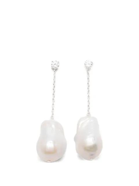 pearl drop earrings by COMPLETEDWORKS