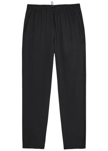 Everyday logo tapered-leg trousers by CONDITION