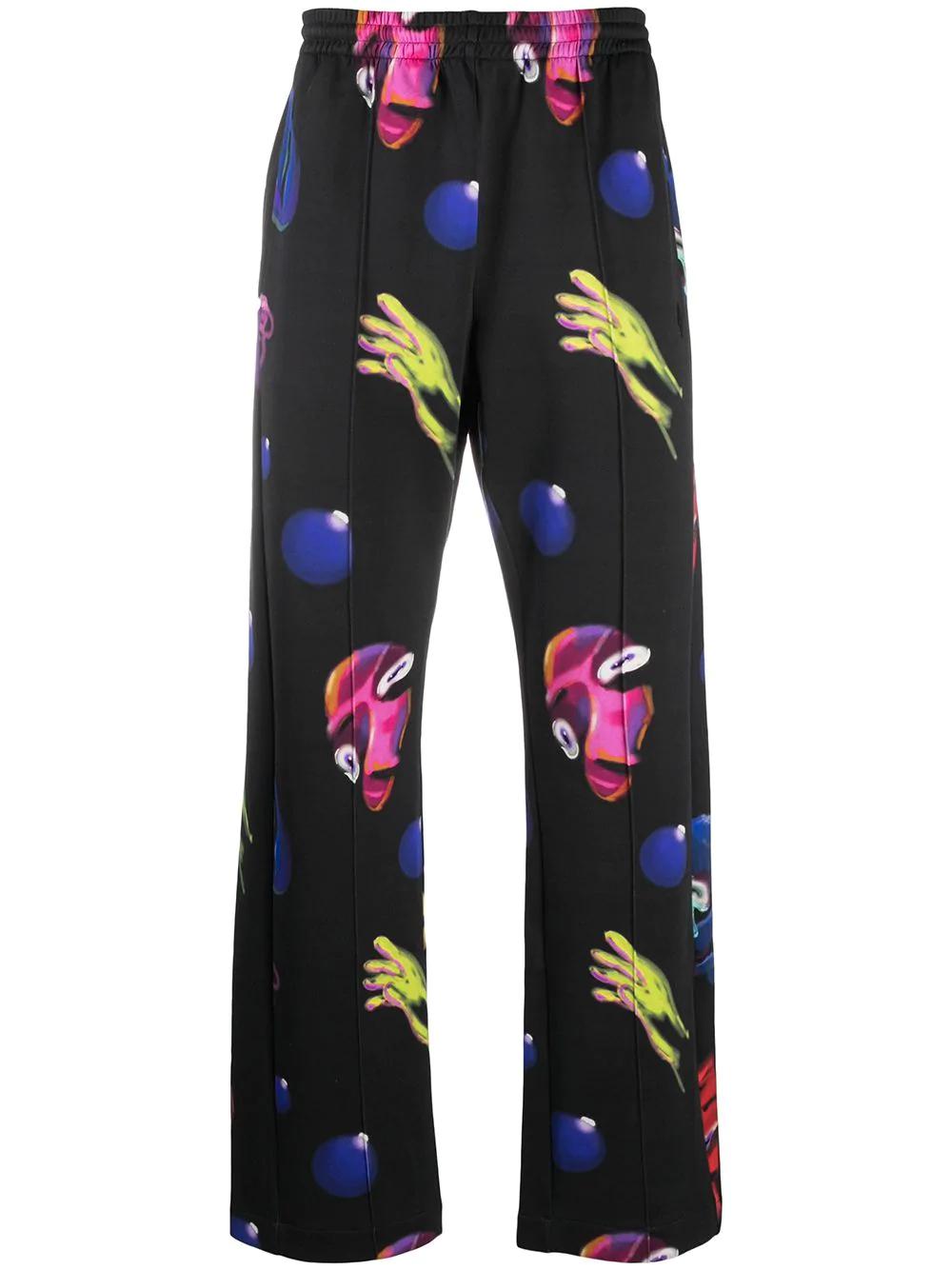 Crazy Faces print track pants by COUNTY OF MILAN