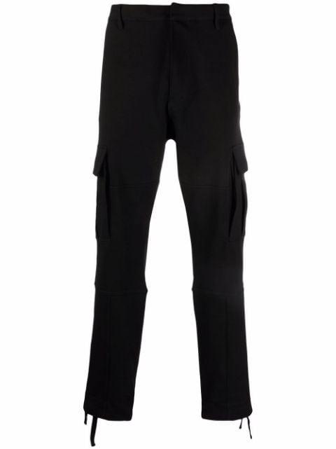Cross embroidered cargo track pants by COUNTY OF MILAN