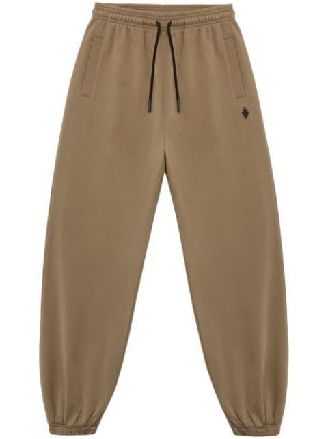 Cross tapered track pants by COUNTY OF MILAN