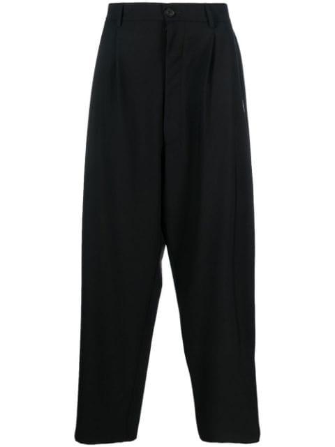 Feather Over pleated trousers by COUNTY OF MILAN