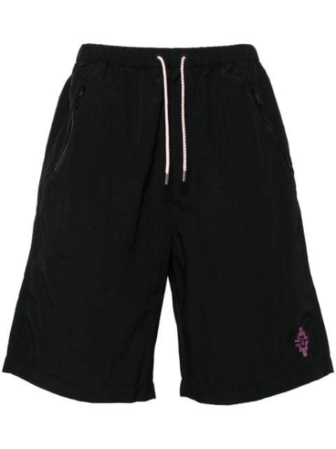 Graffiti Cross bermuda shorts by COUNTY OF MILAN