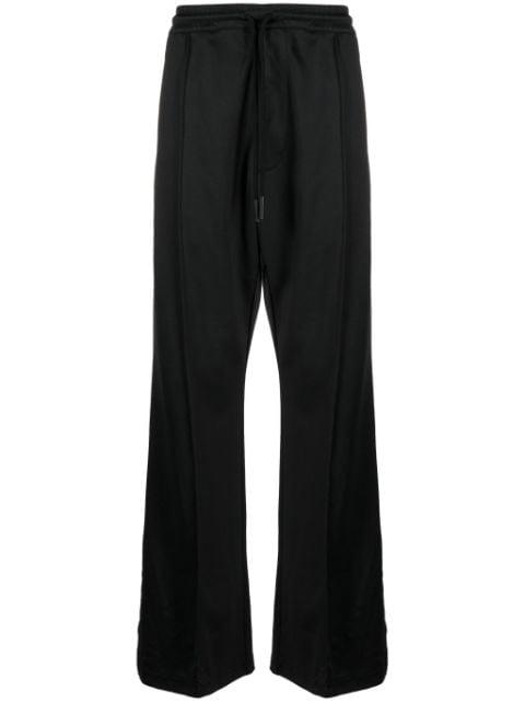 bandana-print track pants by COUNTY OF MILAN