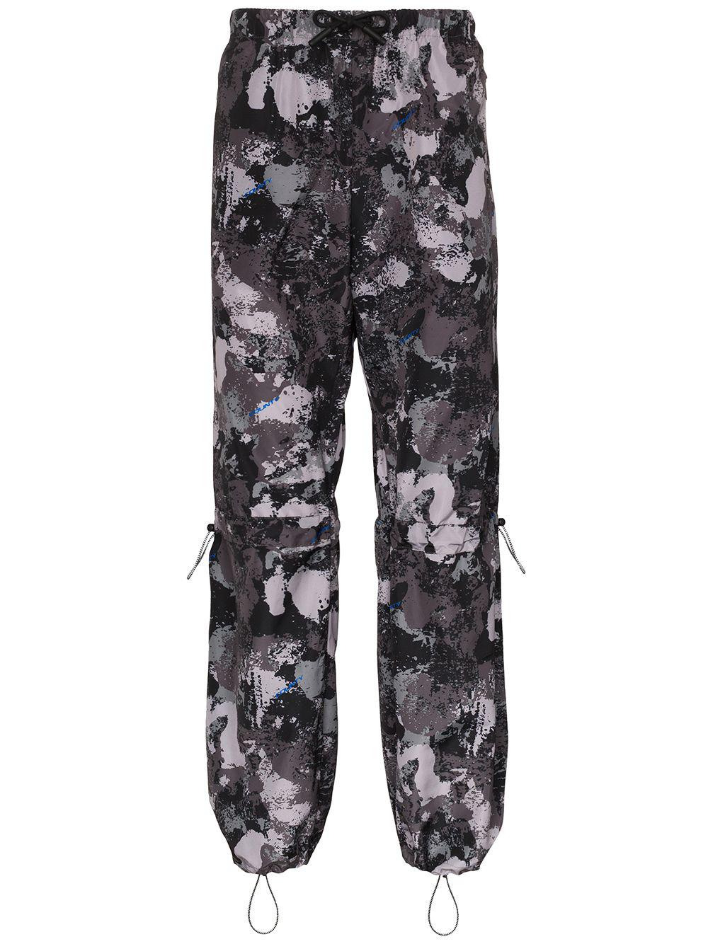 high-rise camouflage-print track pants by COUNTY OF MILAN