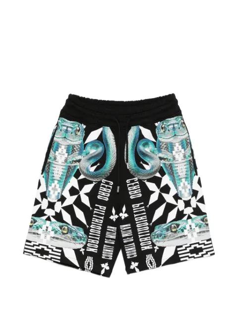 snake printed shorts by COUNTY OF MILAN