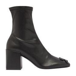 Reedition PU ankle boots by COURREGES