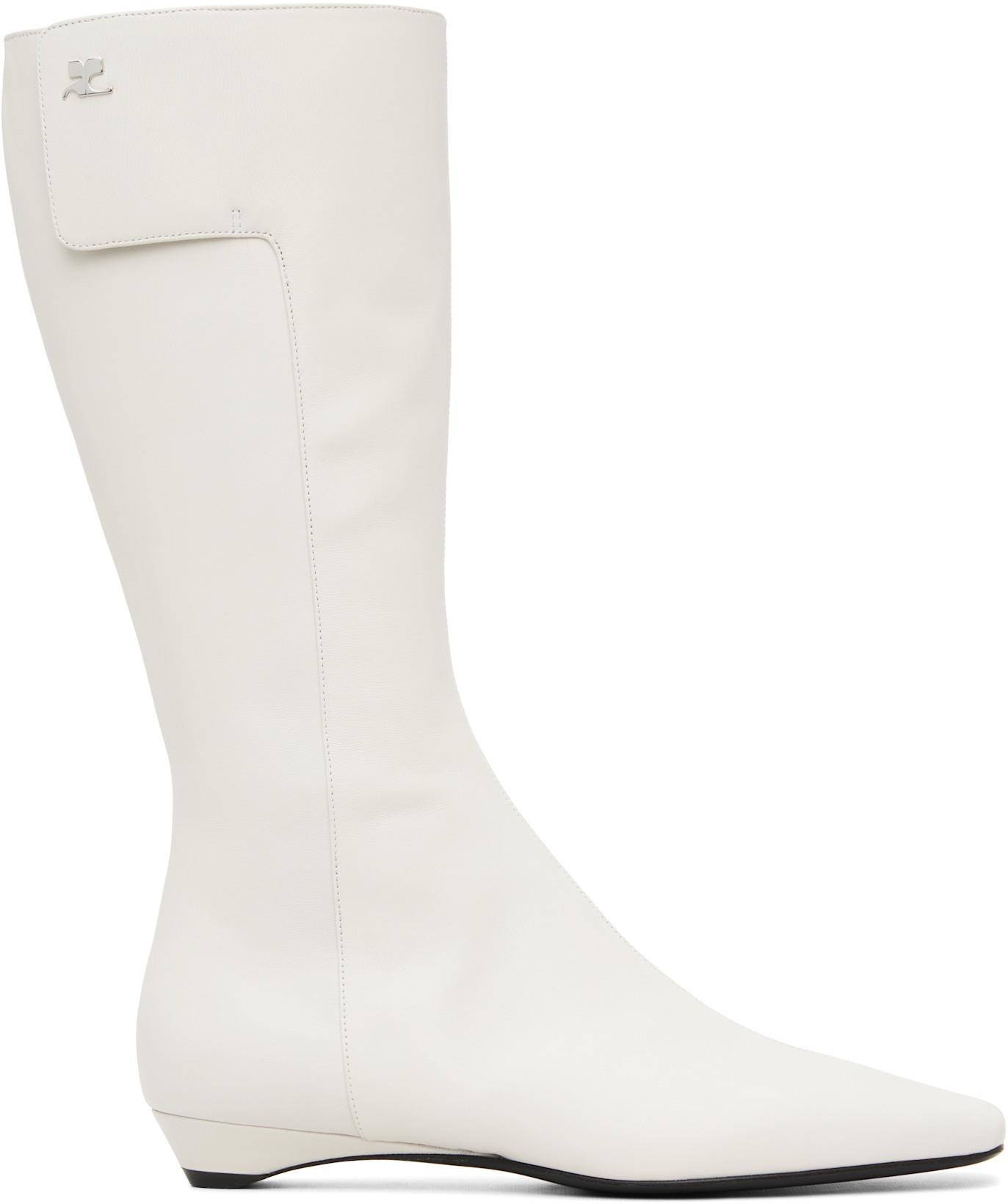 White Heritage Flat Tall Boots by COURREGES