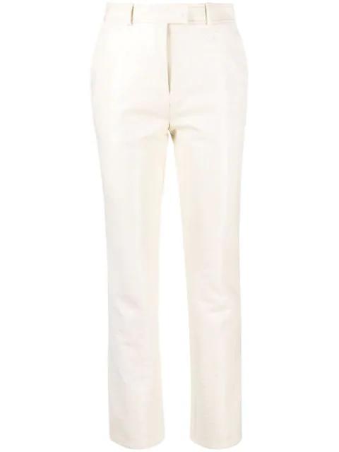 slim-cut vinyl trousers by COURREGES