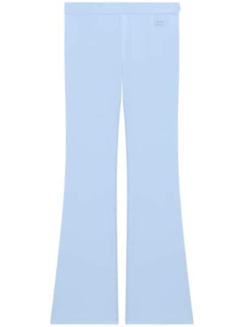 tech jersey flared trousers by COURREGES