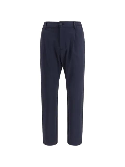 button pleated trousers by CRUNA