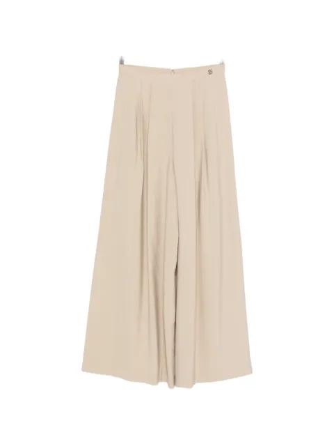 pleated palazzo pants by CURIEL
