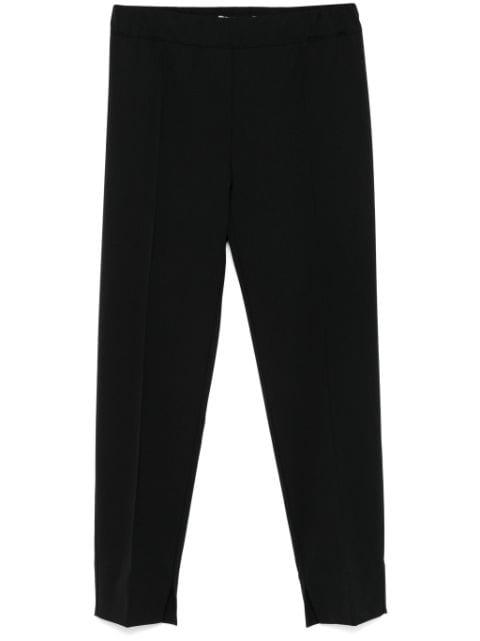 twill tapered trousers by D.EXTERIOR