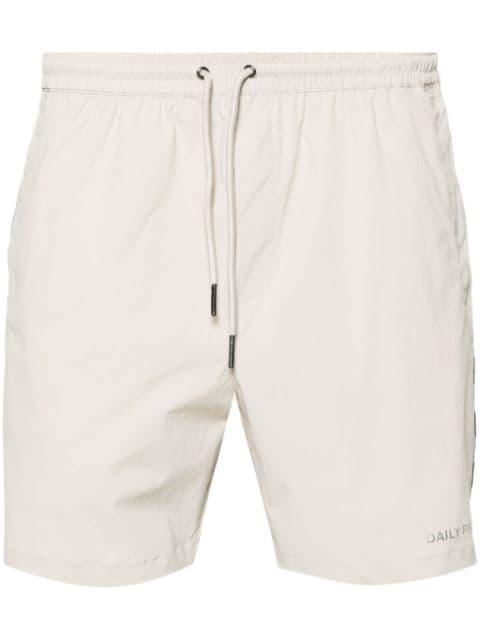 Mehani logo-tape track shorts by DAILY PAPER