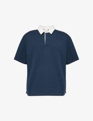 Shield logo-embroidered cotton-jersey polo shirt by DAILY PAPER