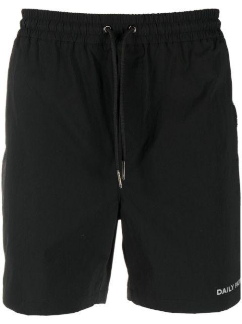 logo-print shorts by DAILY PAPER
