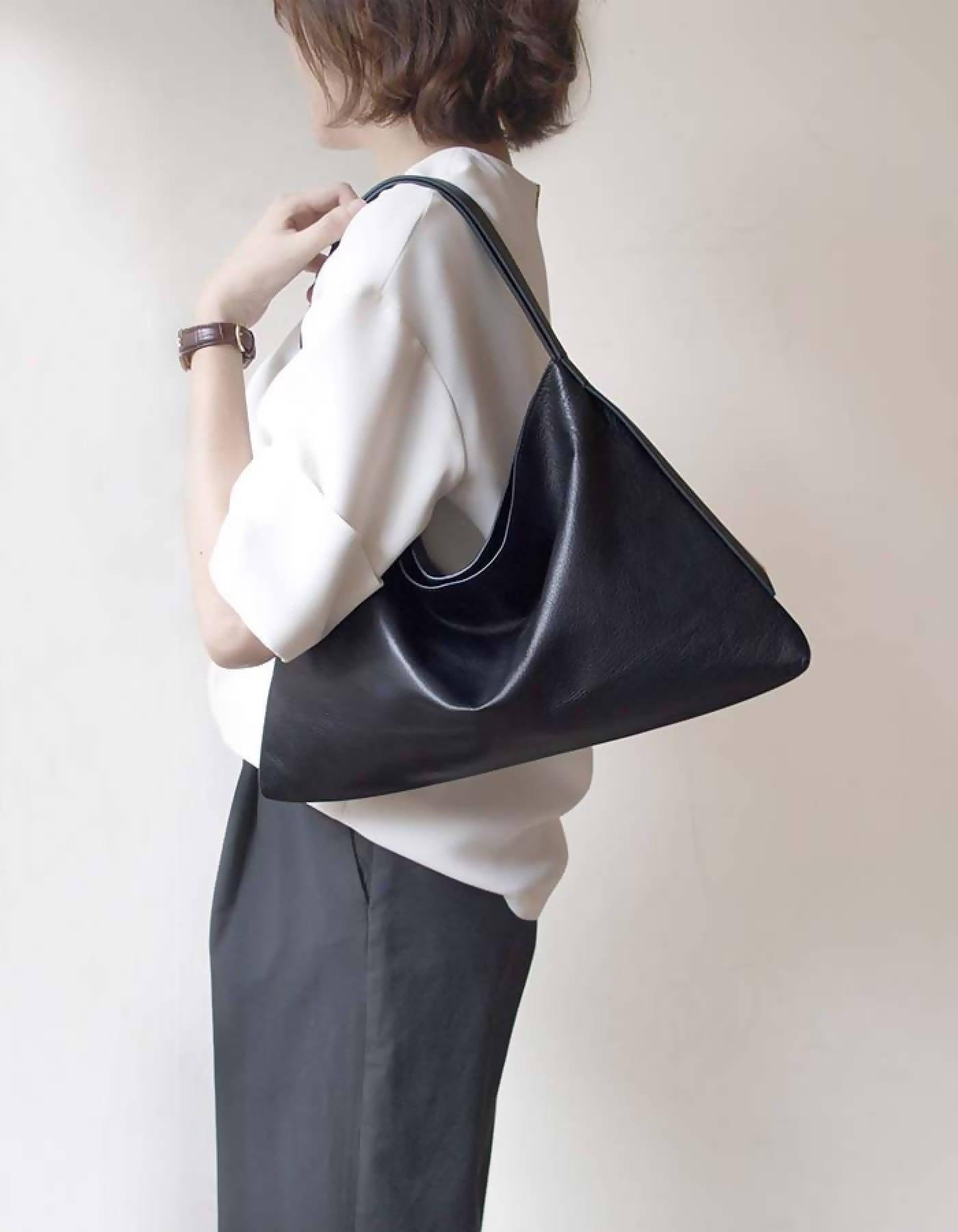 Equilateral Triangle Hobo Bag by DARKER THAN BLACK BAGS