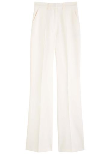 Flared straight-leg stretch-wool trousers by DAVID KOMA