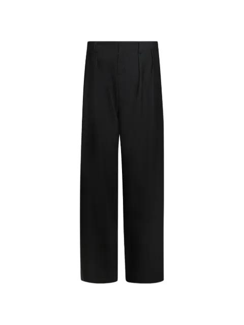 double-pleated tailored trousers by DAVID KOMA