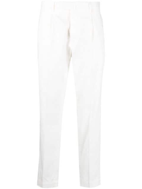 pleated tapered-leg trousers by DELL'OGLIO