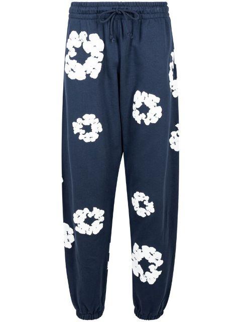Cotton Wreath-print track pants by DENIM TEARS