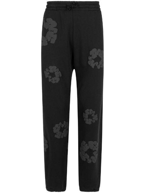 Cotton Wreath-print track pants by DENIM TEARS