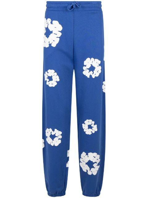 wreath-print track pants by DENIM TEARS