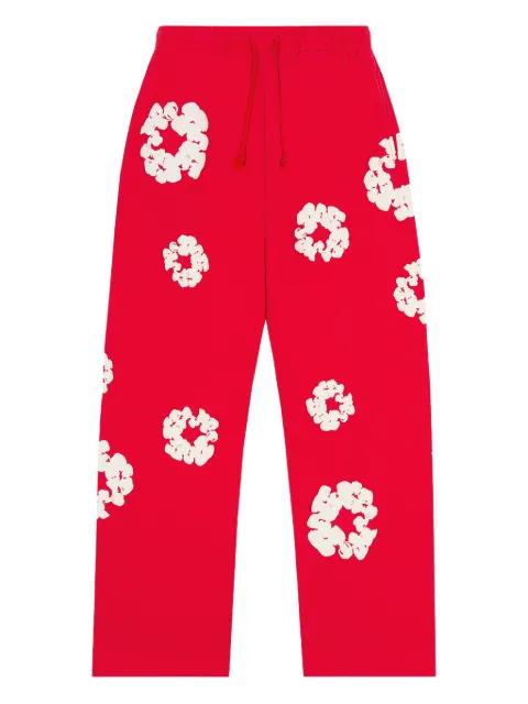 wreath-print track pants by DENIM TEARS