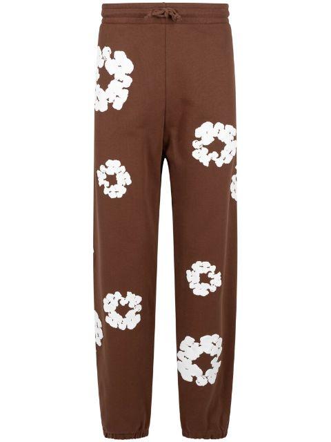 wreath-print track pants by DENIM TEARS