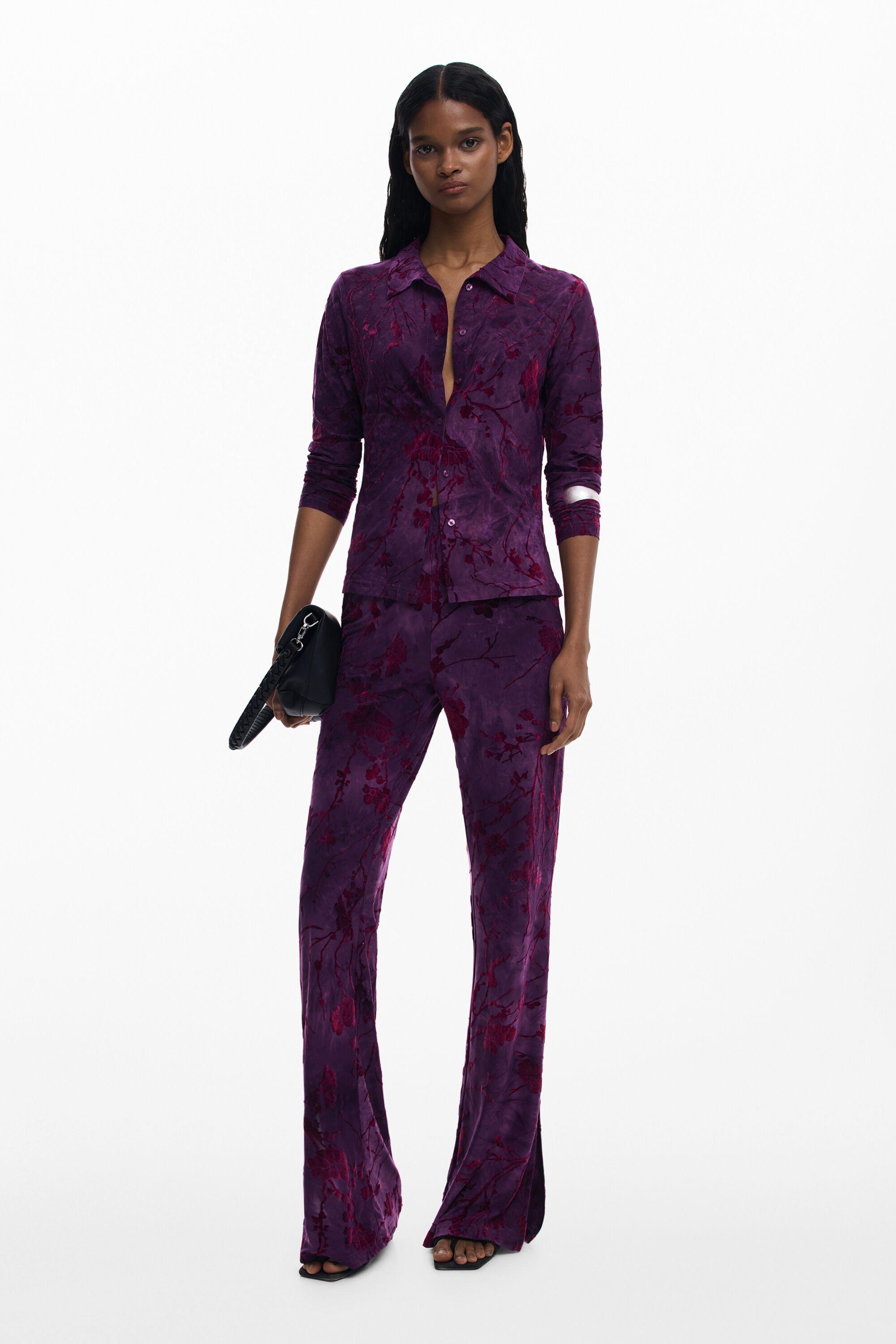 Flared textured fluid pants by DESIGUAL