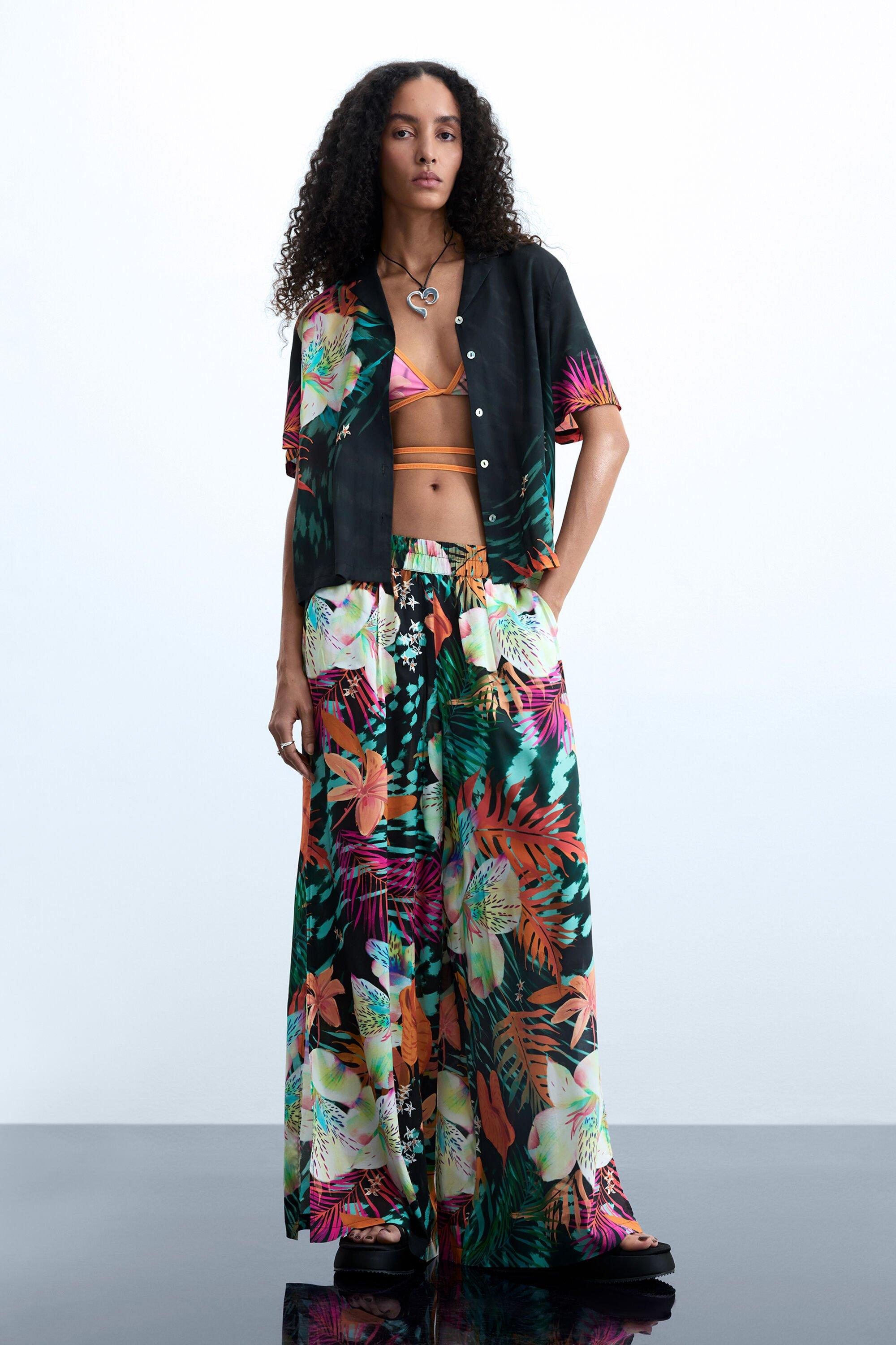 Floral Print Trousers by DESIGUAL