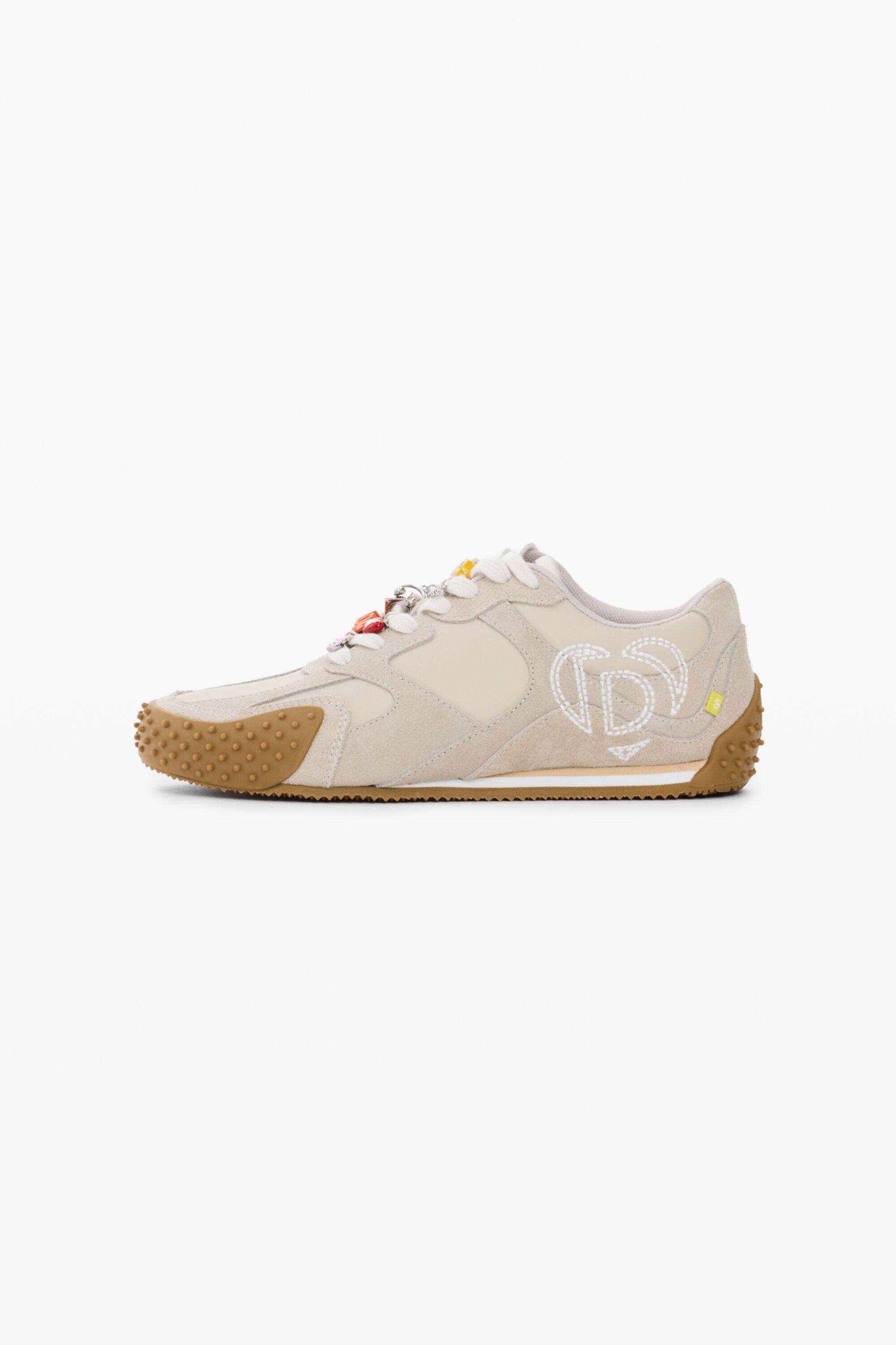 Leather charm sneakers by DESIGUAL
