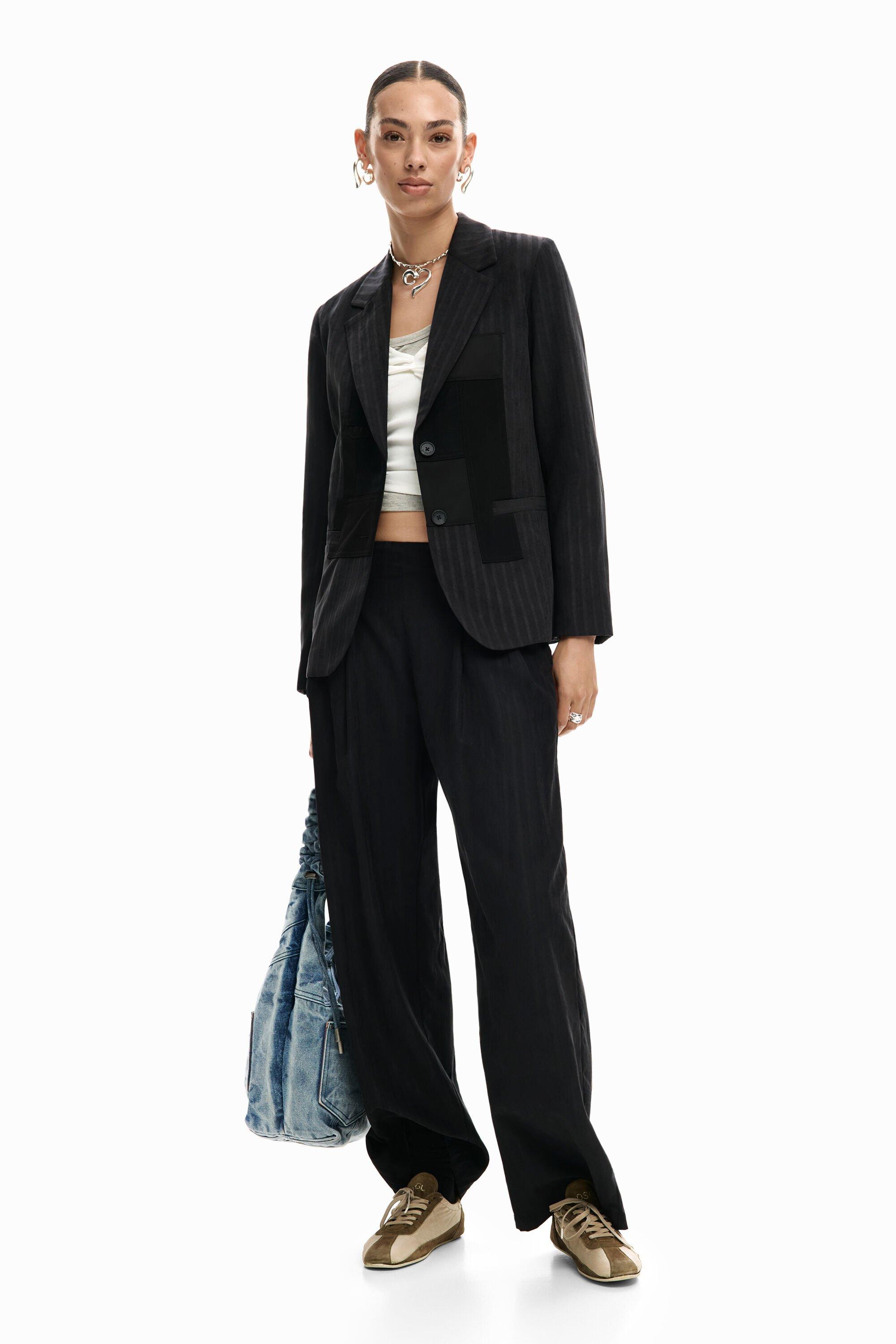 Long pleated trousers by DESIGUAL