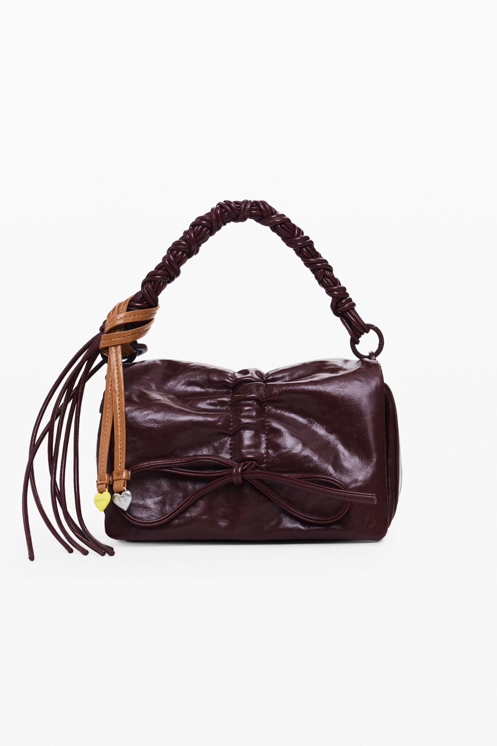 Small shiny bow bag by DESIGUAL