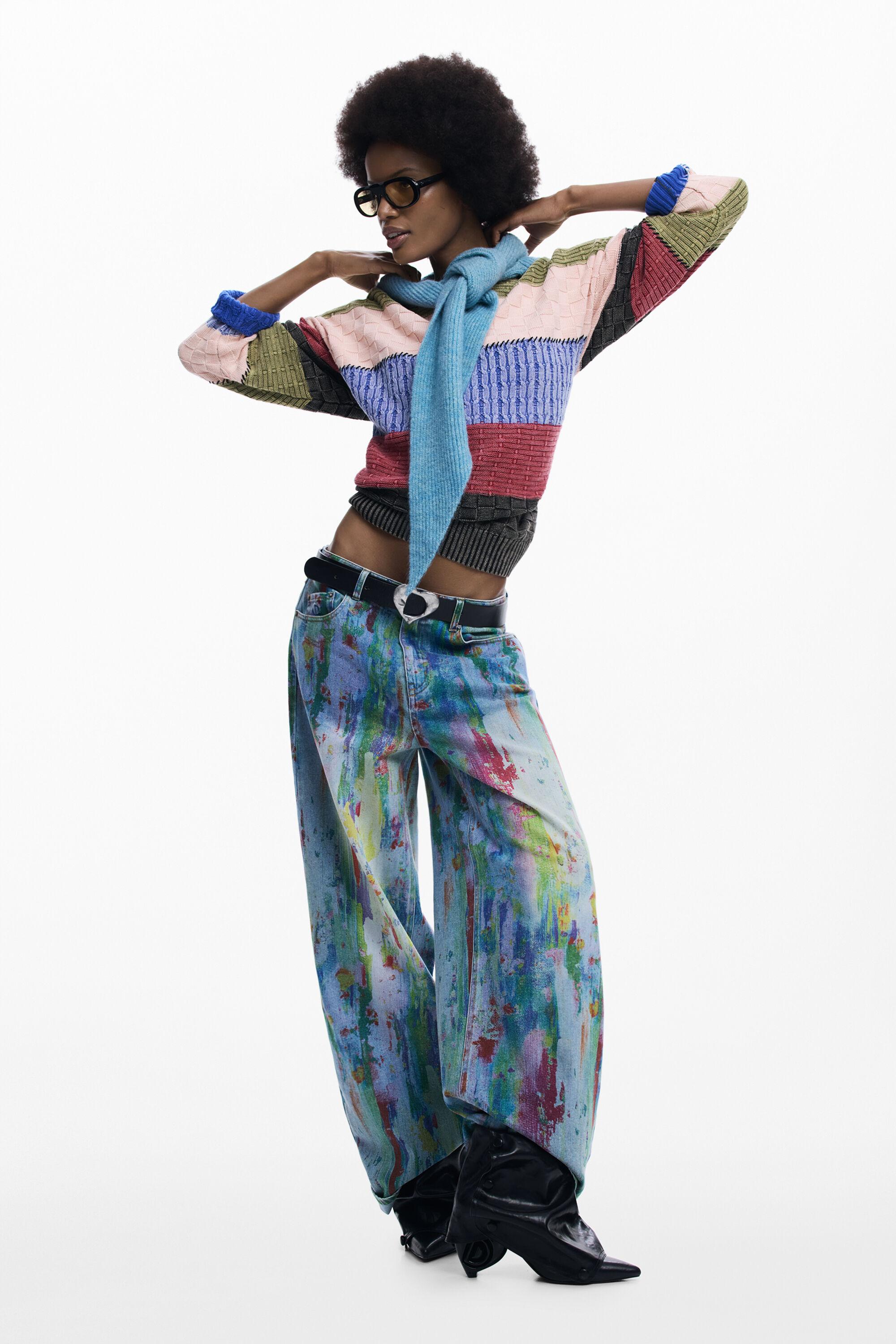 Wide leg splatter jeans by DESIGUAL