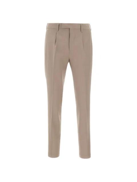 pleated-details trousers by DEVORE