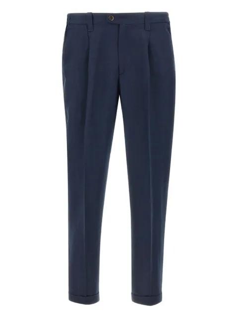 tailored pleated trousers by DEVORE