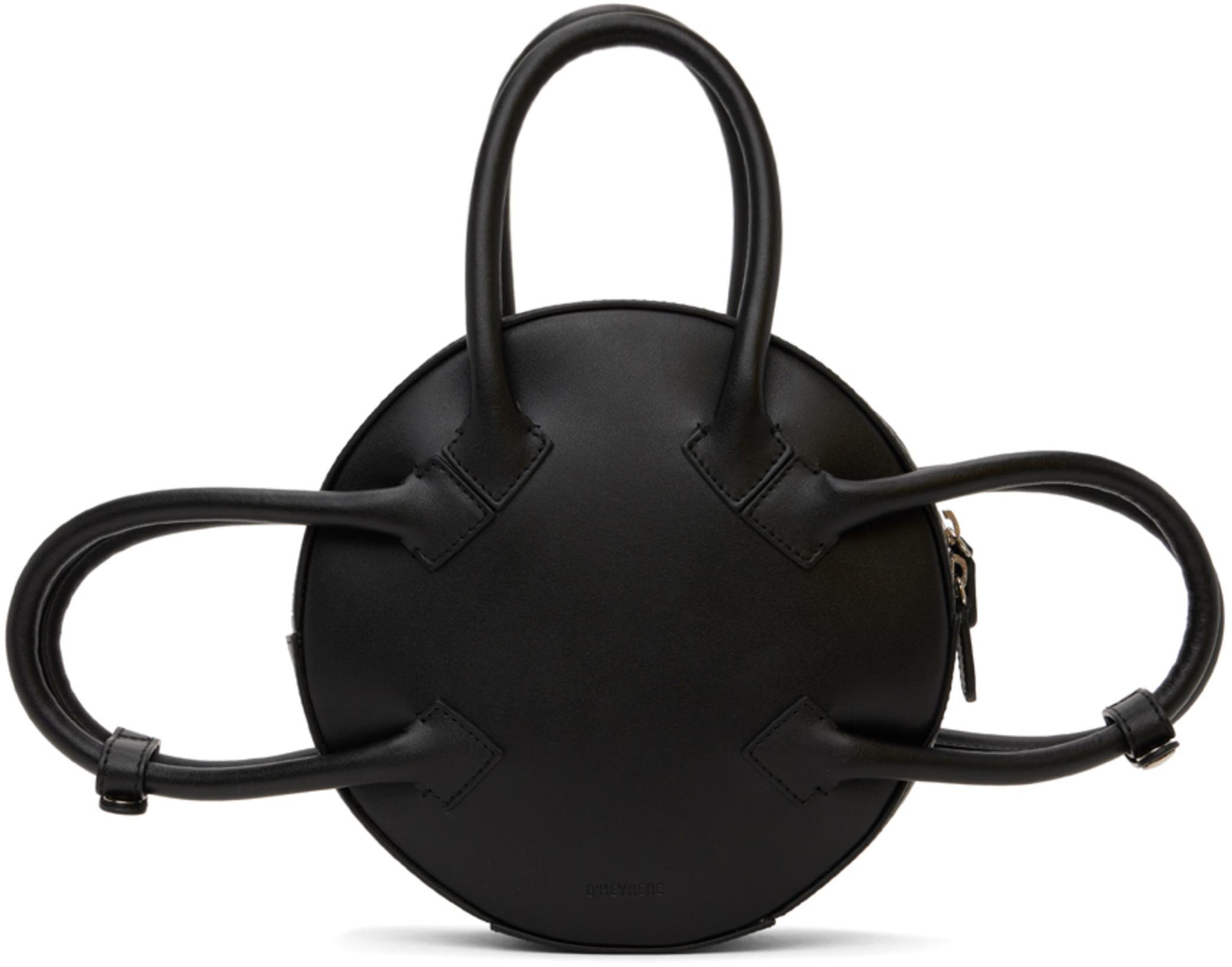 Black Round Twister Bag by D'HEYGERE