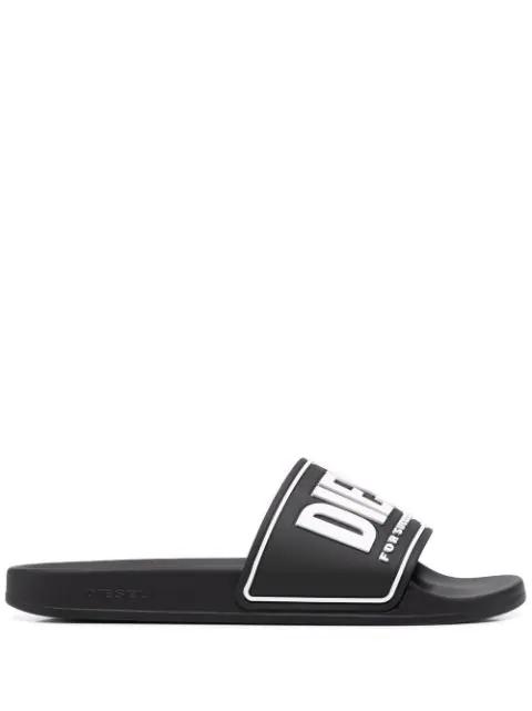 Sa-Mayemi Cc logo-embossed slides by DIESEL