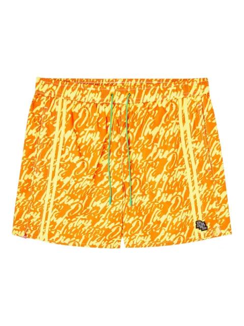 Soccer-41-D-pop patterned swim shorts by DIESEL