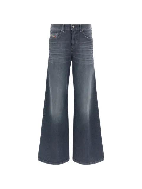 button-fastening flared jeans by DIESEL