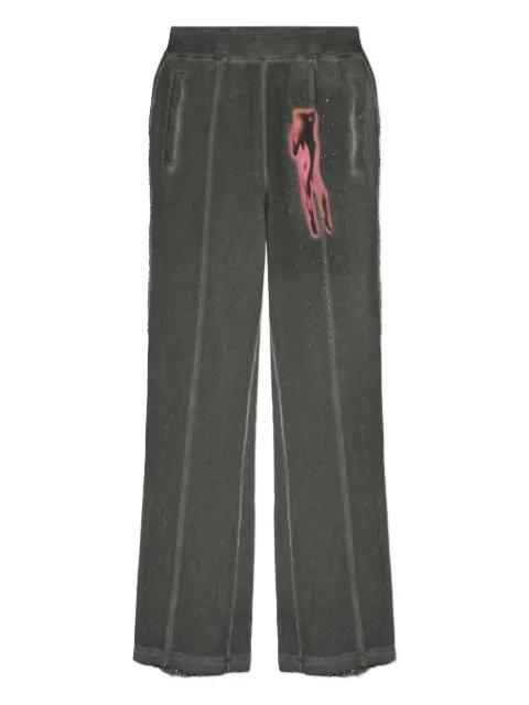 crystal-embellished graphic trousers by DIESEL